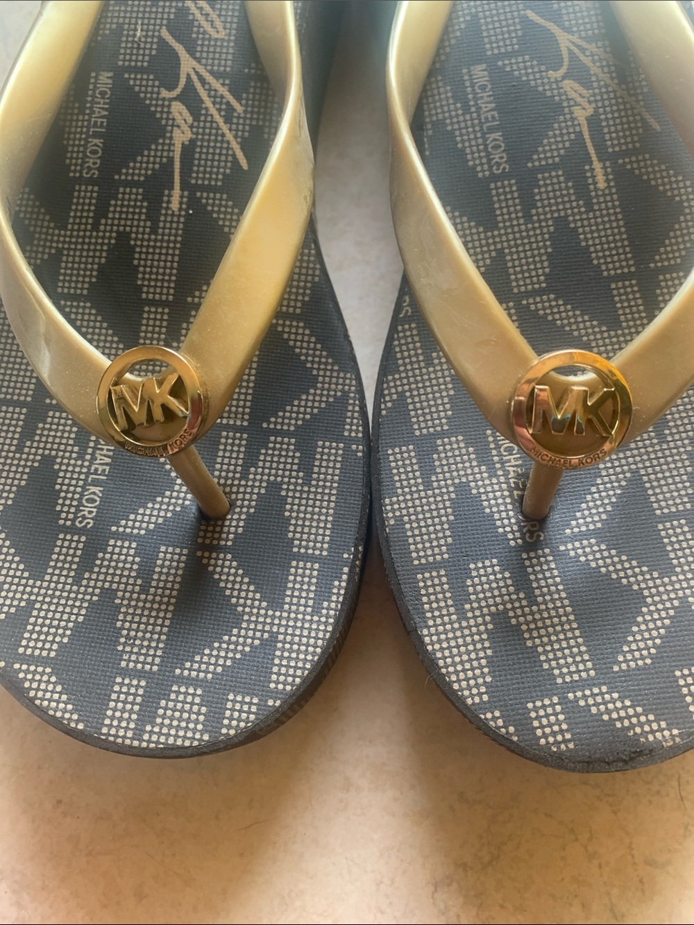 Michael Kors Black and Gold Signature MK Flip Flop Sandals - Picture 2 of 4